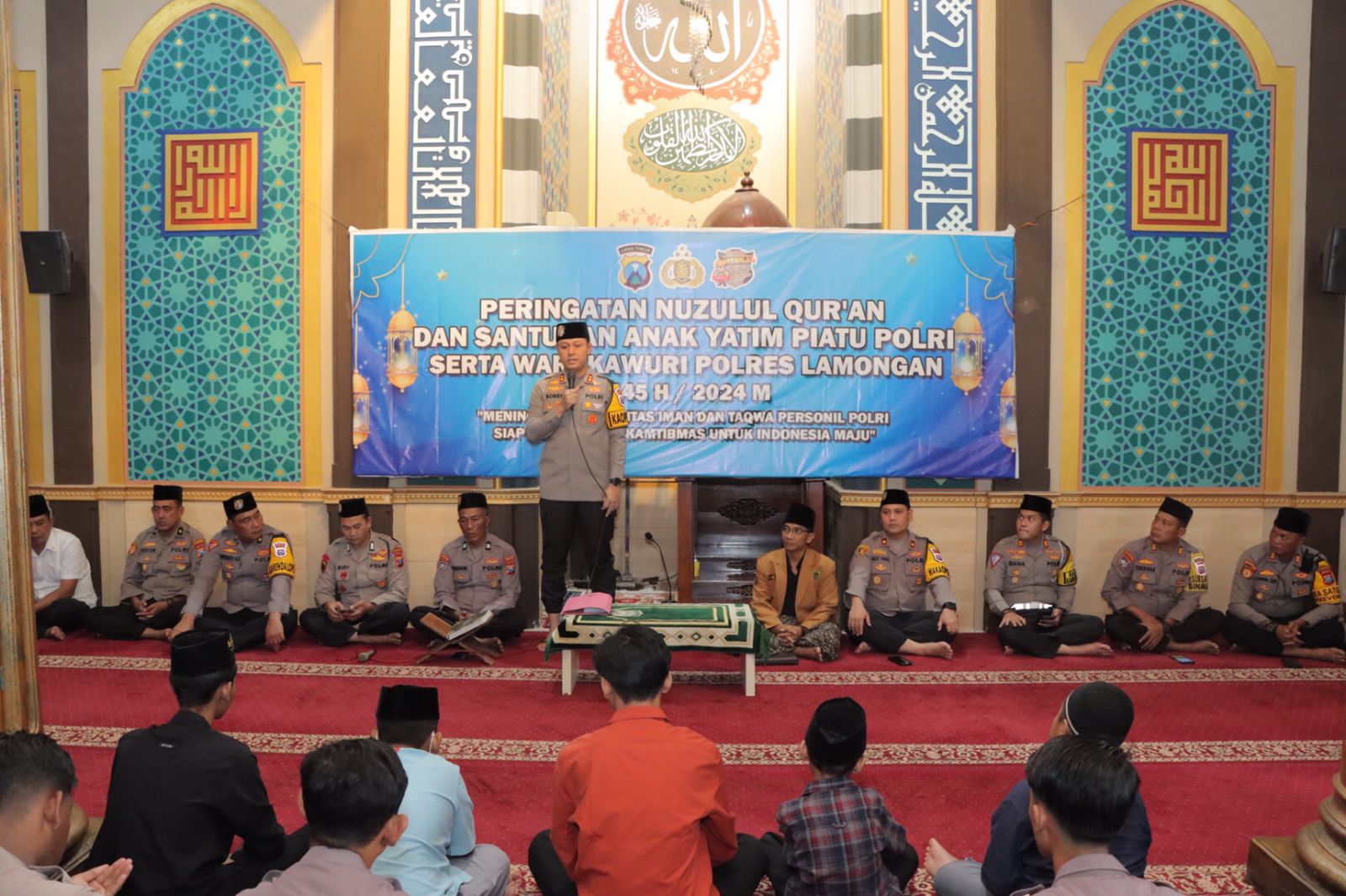 Polres Lamongan Gelar Peringatan Nuzulul Qur’an dan Santunan Anak Yatim Piatu serta Warakawuri Polres Lamongan 1445 H/2024 M